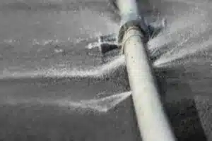 Plumber repairing kitchen faucet leak in Calgary