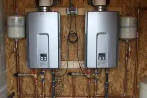 Technician performing tankless water heater repair in Calgary
