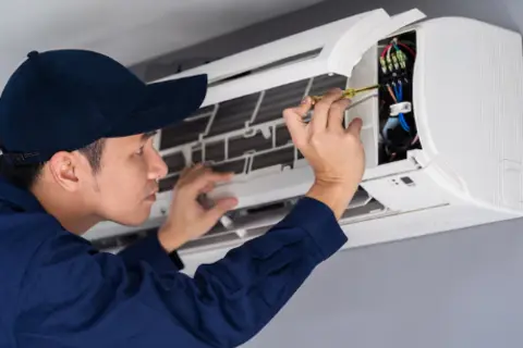 Emergency AC repair technician on-site in Calgary