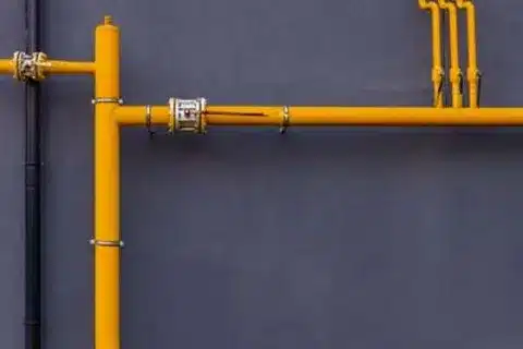 Gas line repair technician at work in Calgary