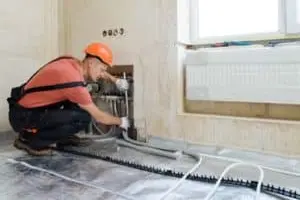 Radiant in-floor heating system under tile floor