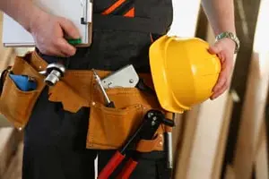 Error code being fixed on a tankless water heater in Calgary