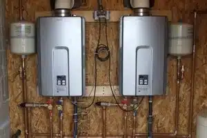 Tankless water heater mounted on wall in Calgary home