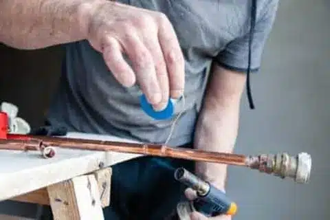 Gas leak detector used by technician in Calgary