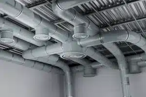 HVAC technician upgrading a furnace in Calgary home