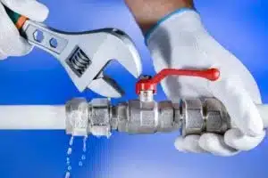Emergency plumbing team fixing pipe leak in Calgary