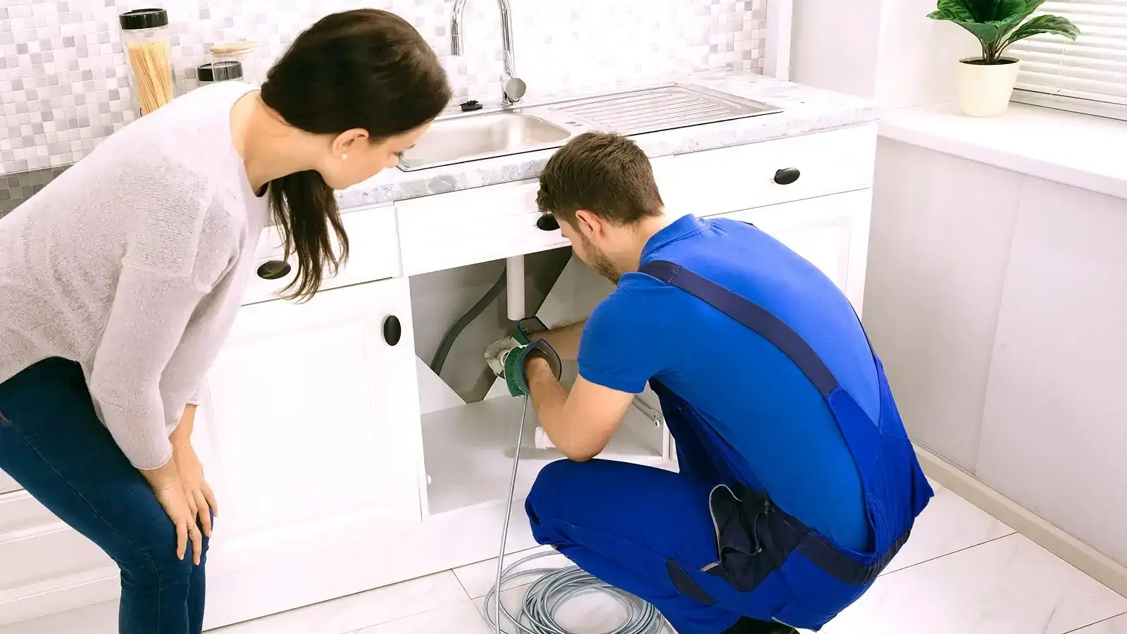 Calgary plumber performing pipe repair service