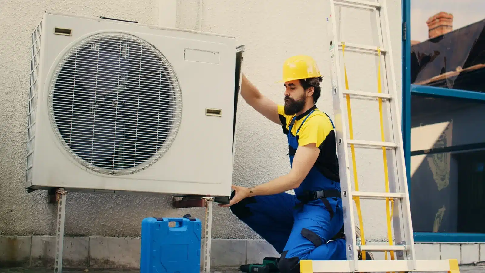 Technician providing emergency AC repair in Calgary