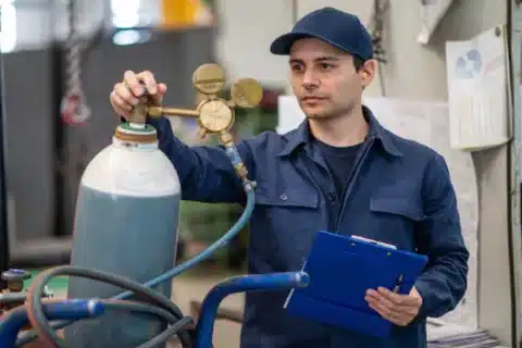 Calgary gas technician inspecting home gas system