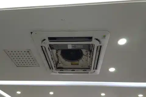 High-SEER AC unit being installed in Calgary