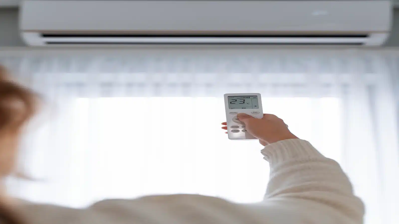 Technician providing emergency AC repair in Calgary